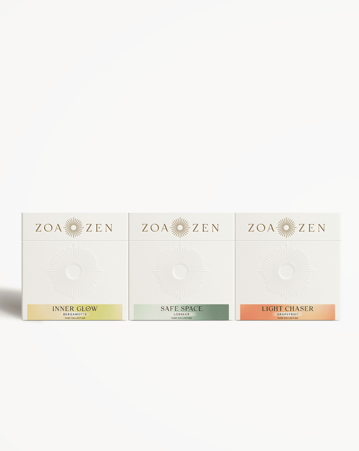 Zoa Zen Duftset mit Inner Glow, Safe Space und Light Chaser. Farbige Verpackungen in Weiß und Pastelltönen.
